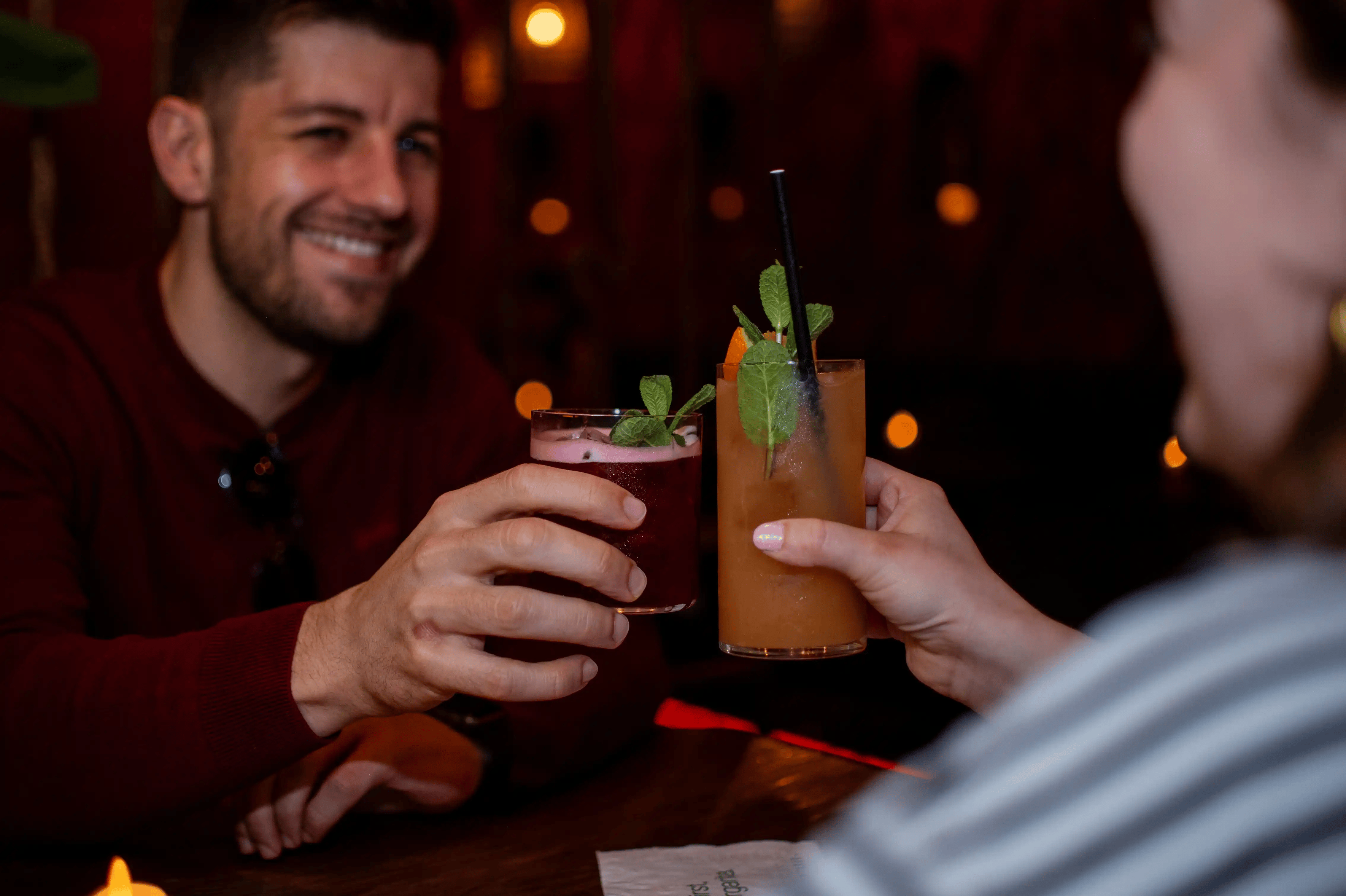 Two people toasting